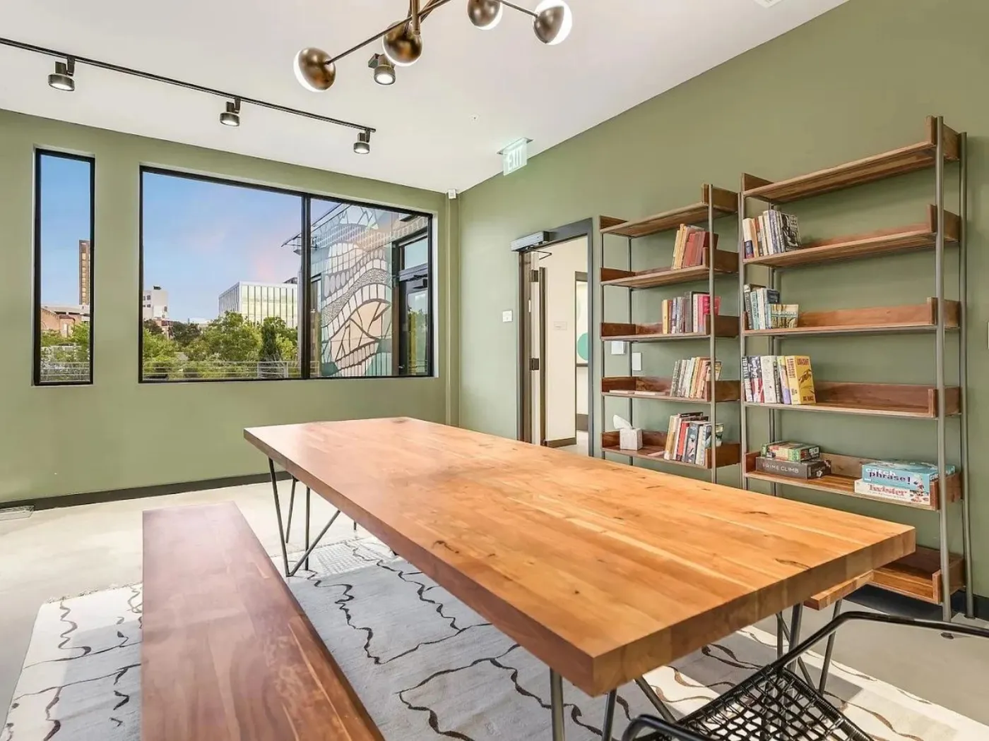 Capitol study room with long wooden table and bookshelves